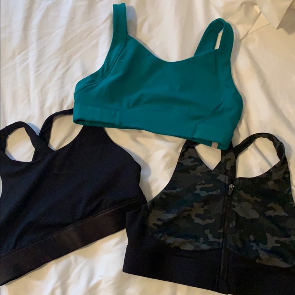 Three Fabletics sports bras